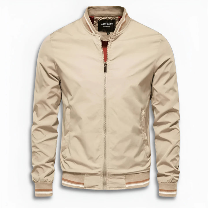 Model wearing a stylish men's water-repellent transition jacket with a stand-up collar, great for fall.