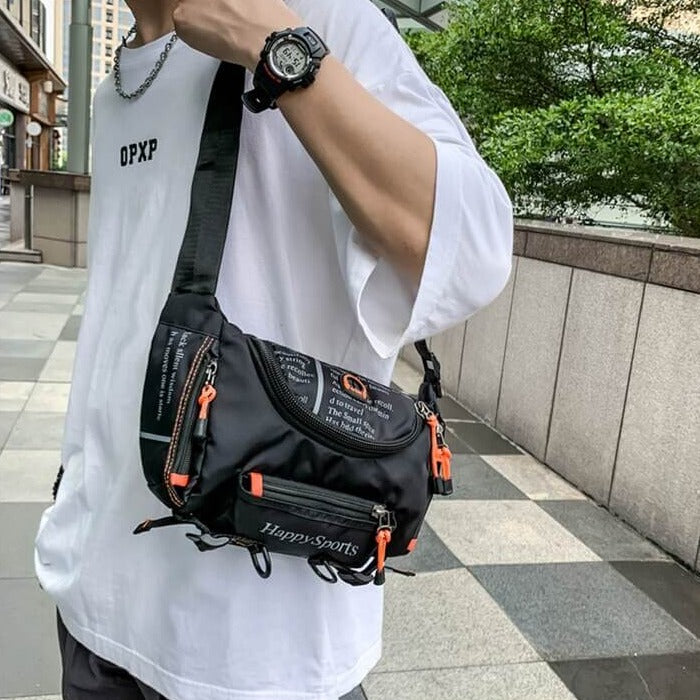 Secure men's water-resistant waist and sling bag for hassle-free travel.