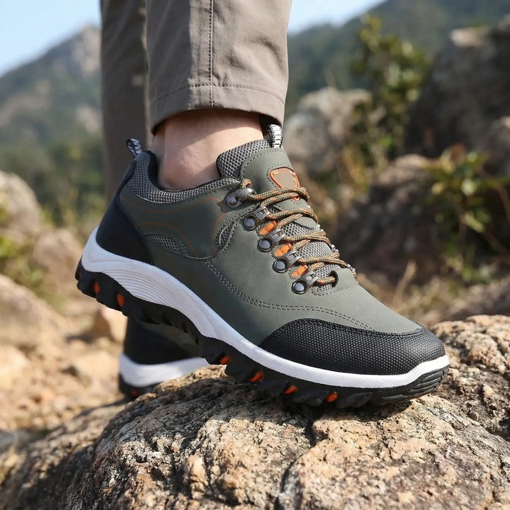 Men's waterproof low-cut hiking shoes for trail adventures. Durable, slip-resistant, and comfortable outdoor footwear.