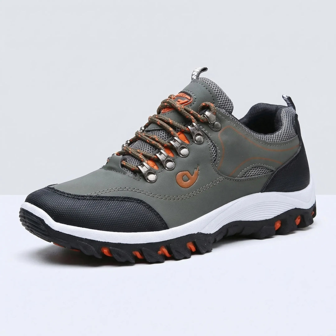 Side view of men's waterproof low-cut trail running shoes, ideal for all-terrain outdoor adventures. Comfortable and supportive.