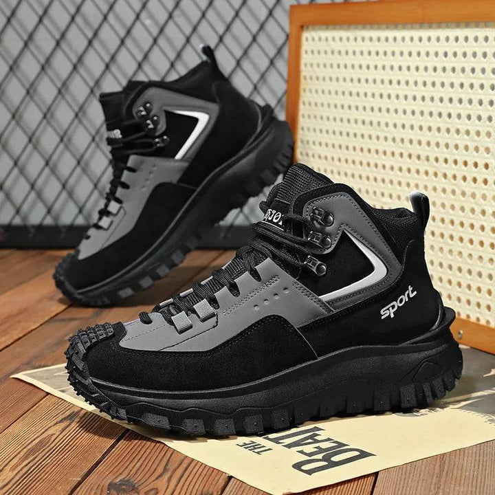 Angled view of men's black safety sneakers, suitable for outdoor sports & work