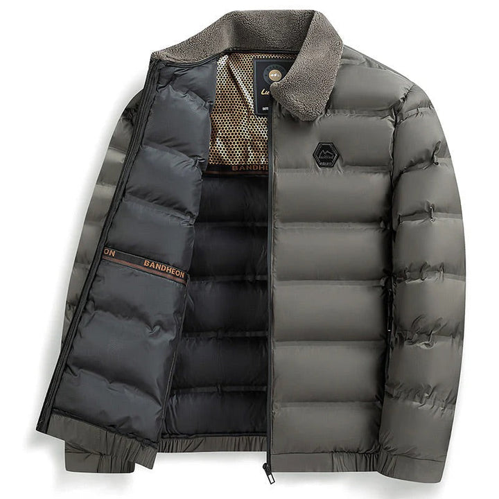 Warm men's padded winter jacket, waterproof & insulated to stay dry in cold, wet weather.
