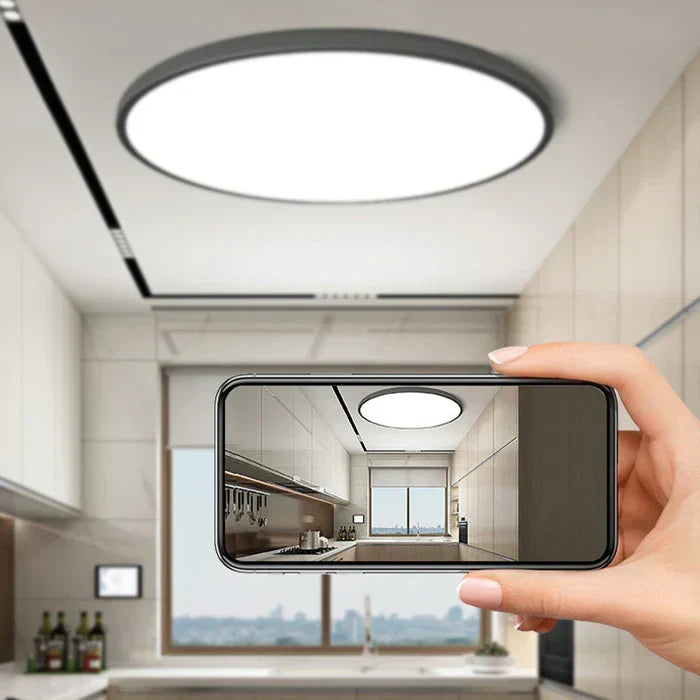 Flat modern LED ceiling light, a minimalist design providing soft, energy-efficient home illumination.