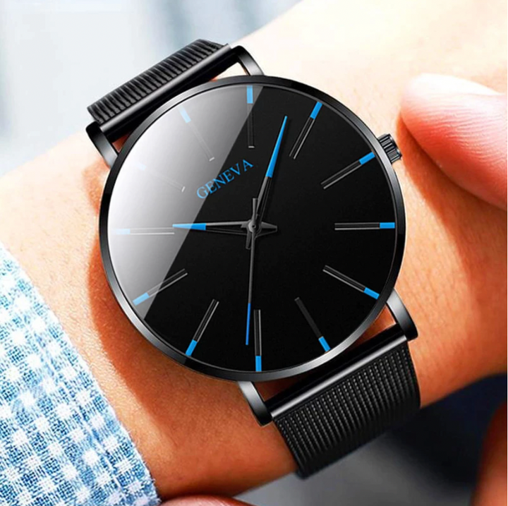 Classic men's quartz timepiece, minimalist design with striking blue accents, offering sophisticated style and durability.
