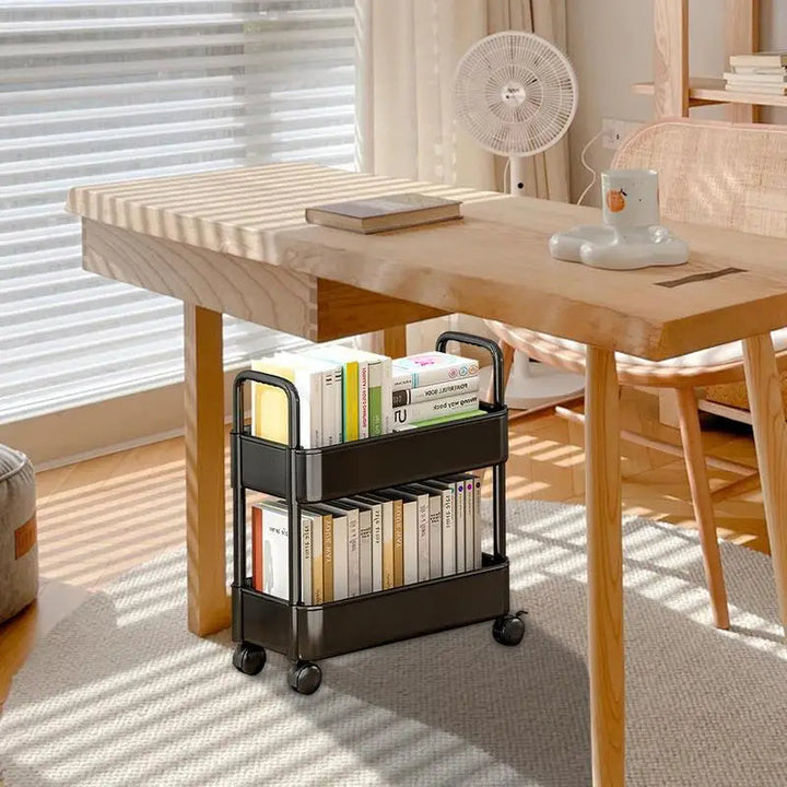 Compact rolling storage cart with multiple shelves, ideal for small spaces in home office, living room, bedroom.