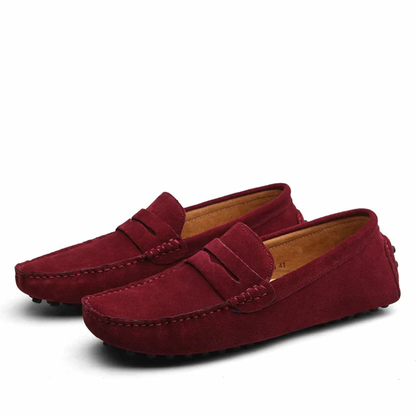 "Mocassini eleganti da uomo in pelle morbida, design moderno, colore nero, perfetti per occasioni formali e casual."