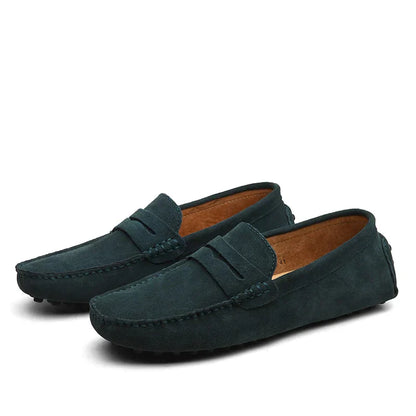 "Mocassini eleganti da uomo in pelle morbida, design moderno, colore nero, perfetti per occasioni formali e casual."