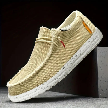 "Mocassini leggeri uomo con design classico, colori beige, blu, grigio e nero, eleganti e confortevoli per ogni occasione."