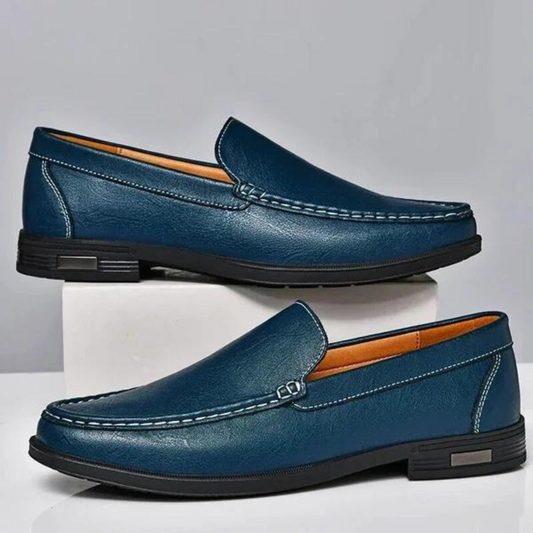 "Mocassini uomo in pelle italiana marrone, design elegante, suola robusta, ideale per outfit casual e formali."