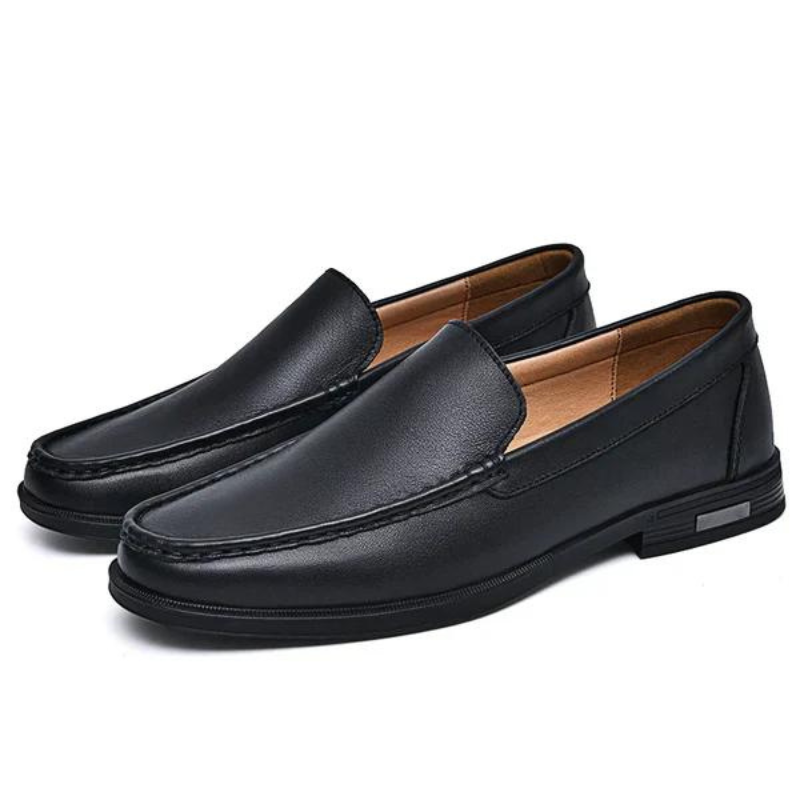"Mocassini uomo in pelle italiana marrone, design elegante, suola robusta, ideale per outfit casual e formali."