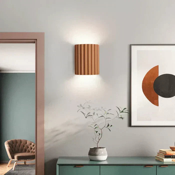 Ambient light wall lamp for interior design. Modern artistic wave shape, contemporary LED accent lighting.
