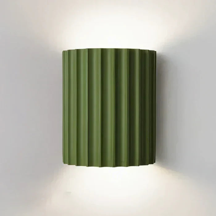 Elegant wave-shaped LED wall lamp. Modern artistic lighting fixture, perfect for contemporary home decor.
