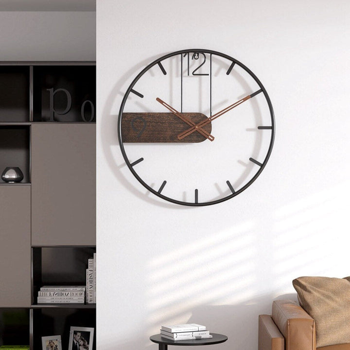Contemporary steel wall clock featuring silent movement & chic wood accents. Perfect decorative modern home & office decor.