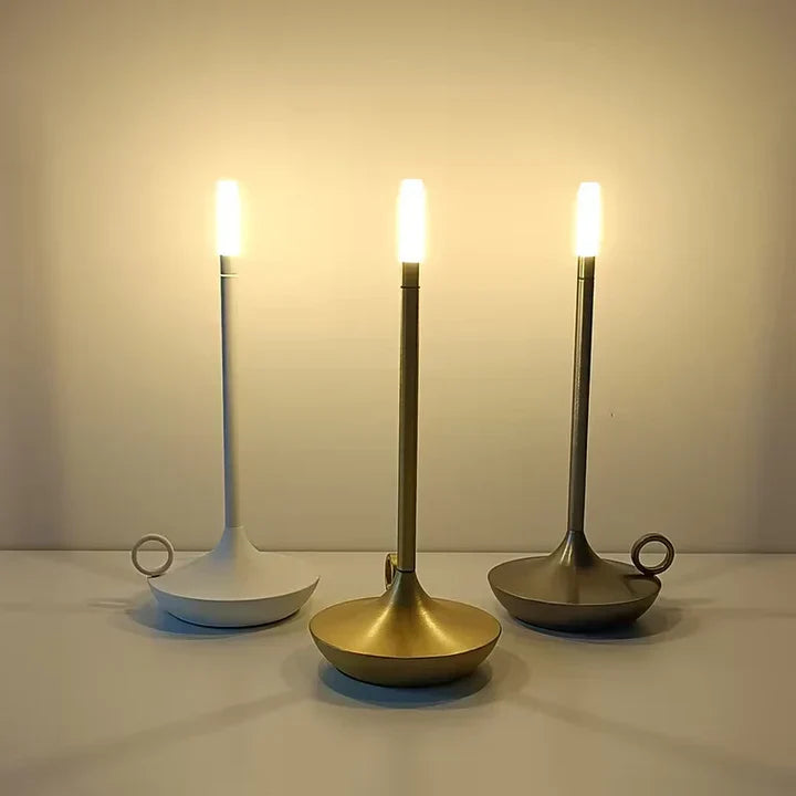 Sleek modern rechargeable candle table lamp, dimmable for ambient light. Portable LED, perfect for home decor.