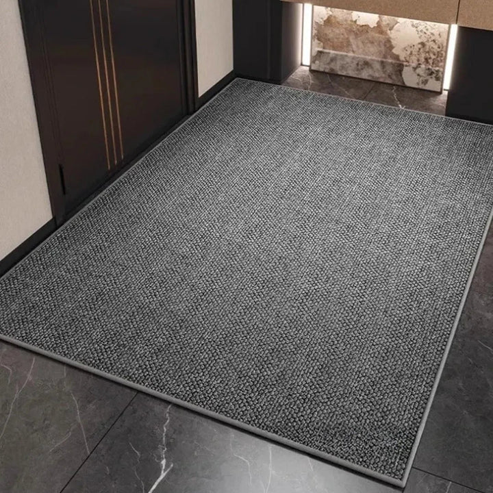 Stylish geometric doormat, absorbent for superior moisture control & modern home entryway decor.