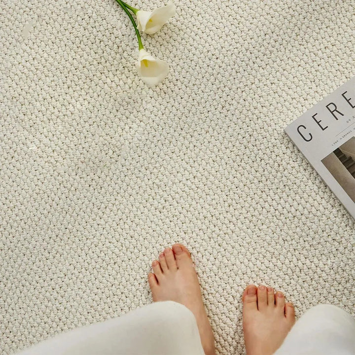 Stain-resistant geometric entryway mat, durable & absorbent for effective moisture control & home decor.