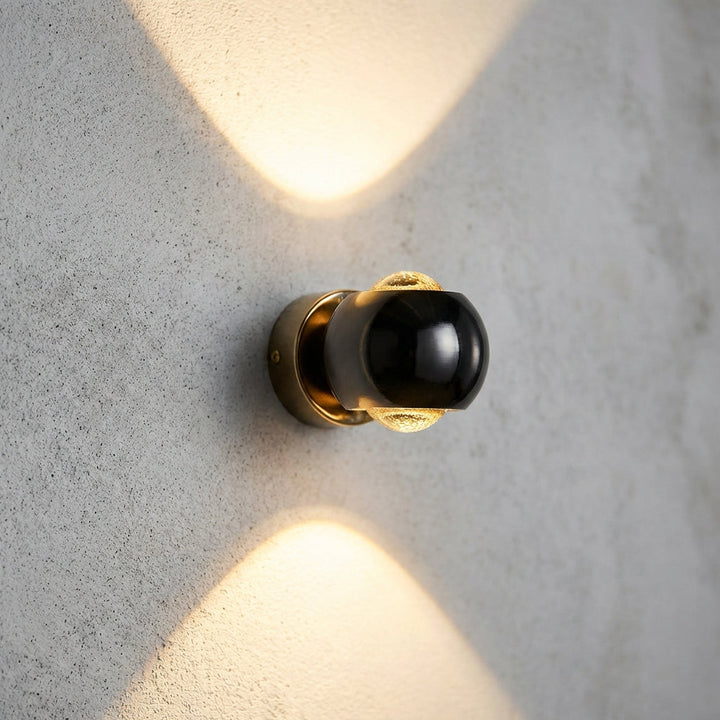 Modern Glintara adjustable LED wall sconce for ambient lighting. Contemporary indoor decorative lamp fixture.