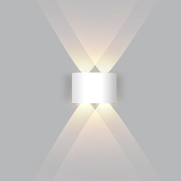 Energy-efficient LED outdoor wall lamp, stylish & functional for patios.