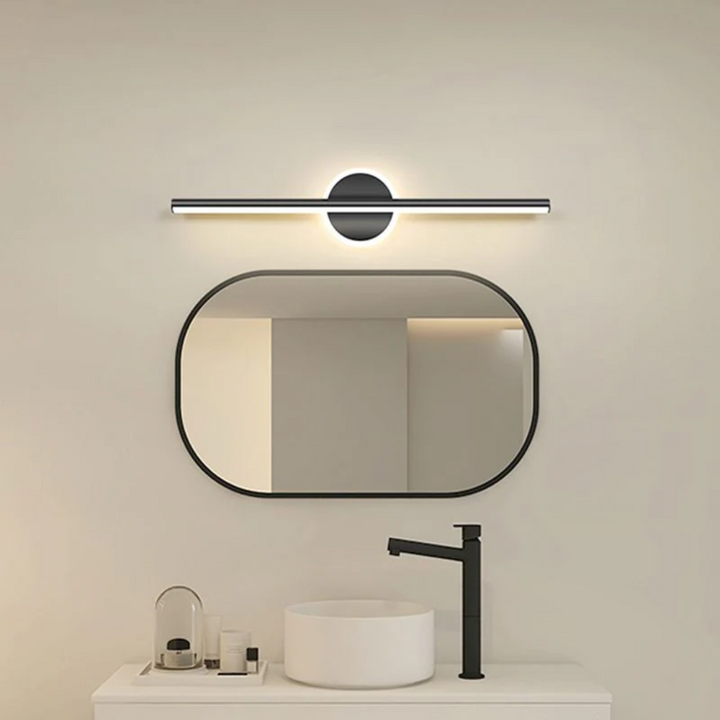 Gold finish LED wall lamp, round modern design, enhances living room or hallway home decor.
