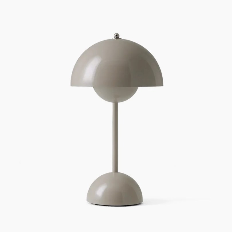 Dimmable LED reading lamp with touch control, adjustable light for bedside tables or desks.