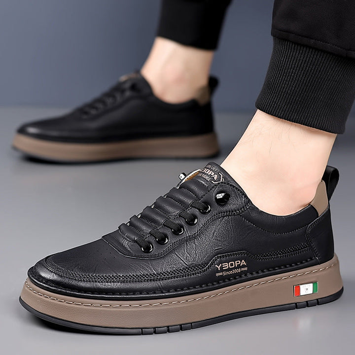 Men's fashion footwear, a versatile pair of everyday sneakers with a sleek, modern look.