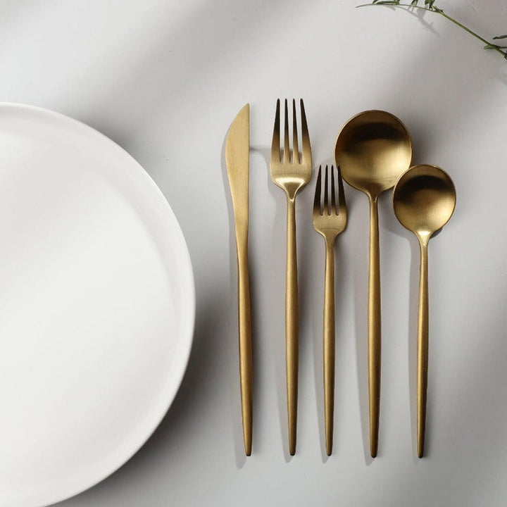 Matte silver flatware set, essential modern tableware for sophisticated dining.