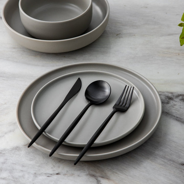 Rose gold minimalist spoon, part of an elegant flatware set for modern dining.