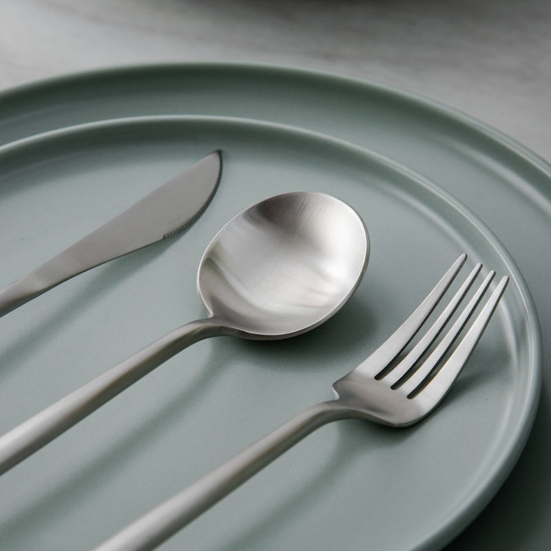 Rose gold minimalist flatware set, a modern touch for elegant home decor.