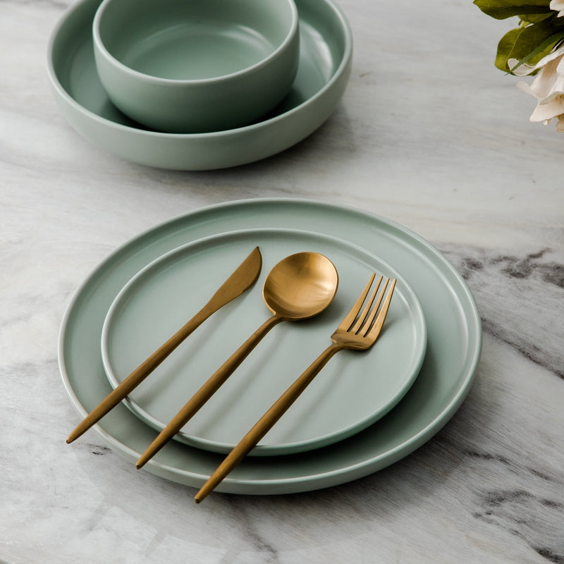 Elegant rose gold flatware set for entertaining, showcasing modern tableware design.