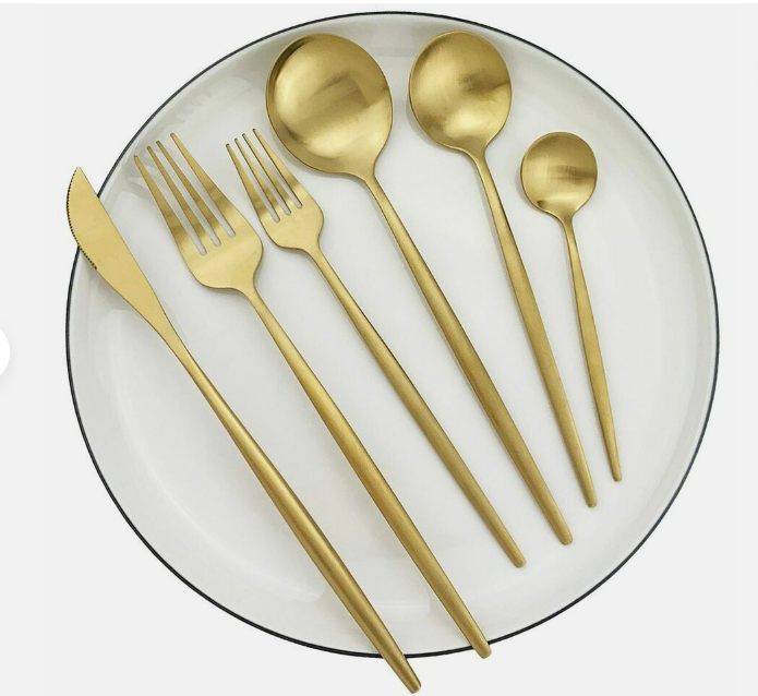 Matte silver minimalist flatware set, showcasing clean lines for modern dining.