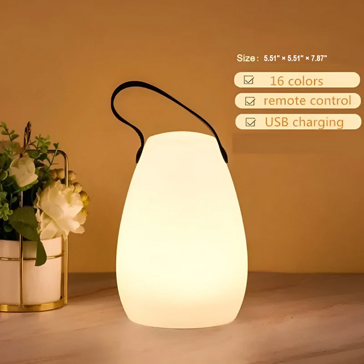 Ambient portable LED table lamp, waterproof & wireless, designed for indoor/outdoor modern spaces.