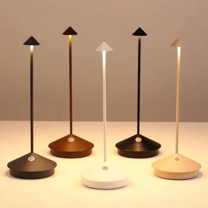 Portable LED table light, rechargeable and cordless, perfect for modern outdoor decor.