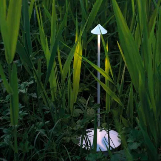 Wireless rechargeable LED lamp, portable accent lighting for contemporary spaces.