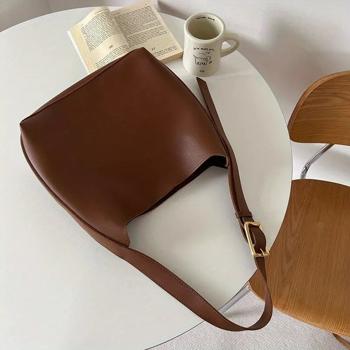 Sleek black modern shoulder bag, women's versatile accessory, perfect for daily fashion & comfort.