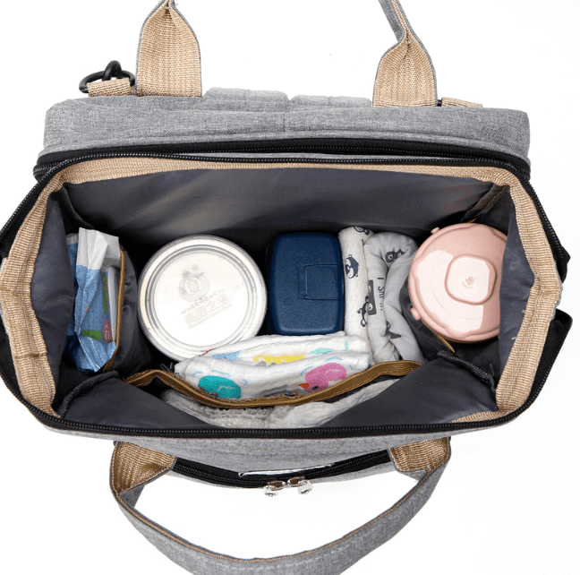 Easy-to-use portable baby bed and diaper bag, folds into a travel backpack for parents.