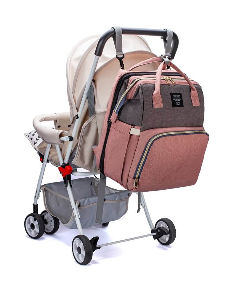 Outdoor baby travel bed and nappy bag backpack, great for parks or visits.