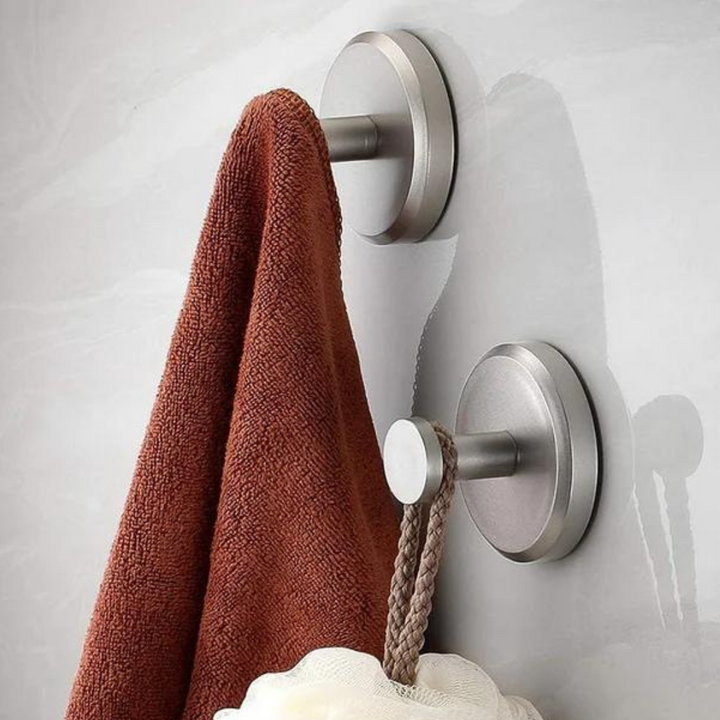 Durable, removable Instant Grip Suction Hooks for secure, tool-free home organization.