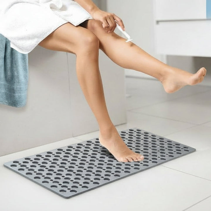 Hygienic non-slip shower mat, ensuring bathroom safety and easy cleaning on wet floors.