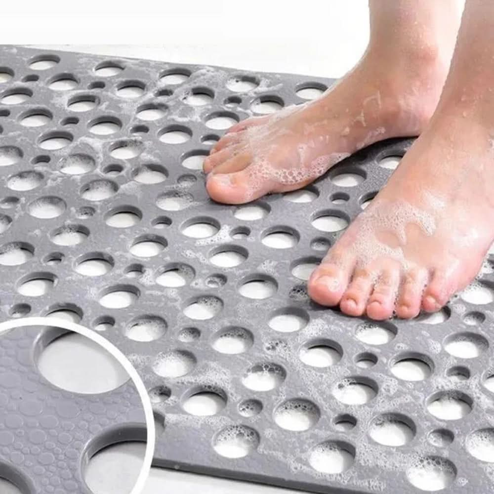 Suction cup non-slip shower mat, ensuring ultimate bathroom safety & wet floor protection.