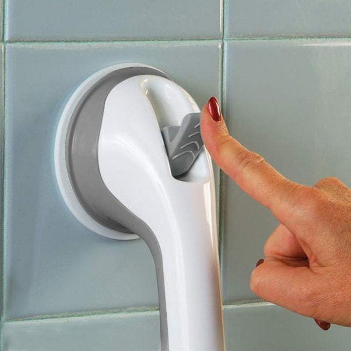 Non-slip suction grab bar, a reliable bath safety & shower handrail, offering sturdy support & mobility aid.