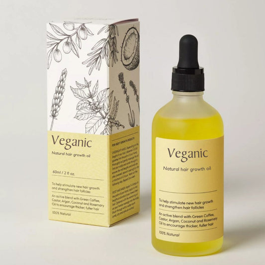 "Olio crescita capelli naturale, siero vegano, flacone trasparente con liquido dorato e tappo bianco."