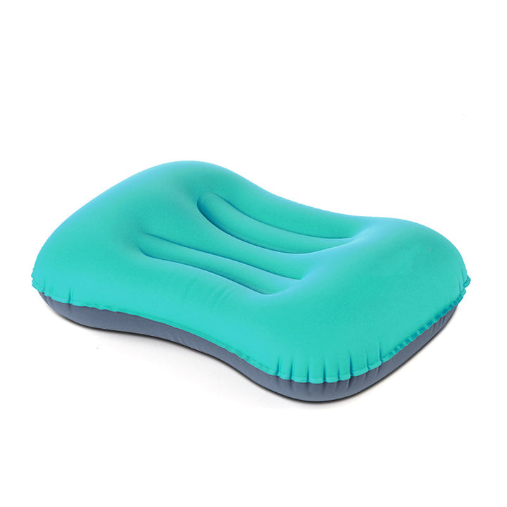 Orange inflatable camping pillow, compact & lightweight for outdoor adventures and neck support