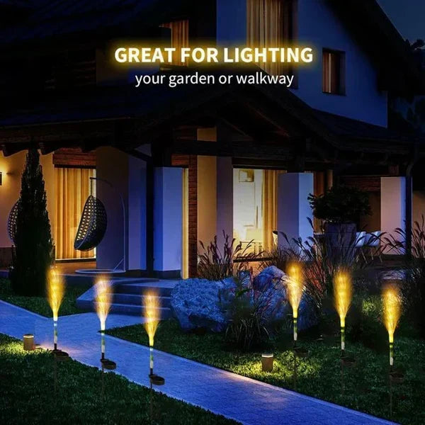 Pathway lighting with elegant reed solar lights, providing ambient garden lighting at night.