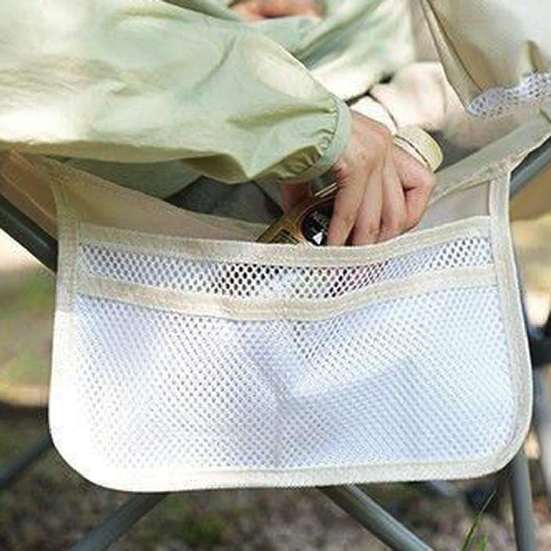 Camping chair with adjustable recline and footrest, designed for outdoor use