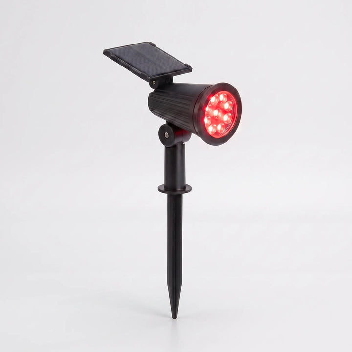 Adjustable solar LED spot light for outdoor landscape, garden, or pathway illumination.