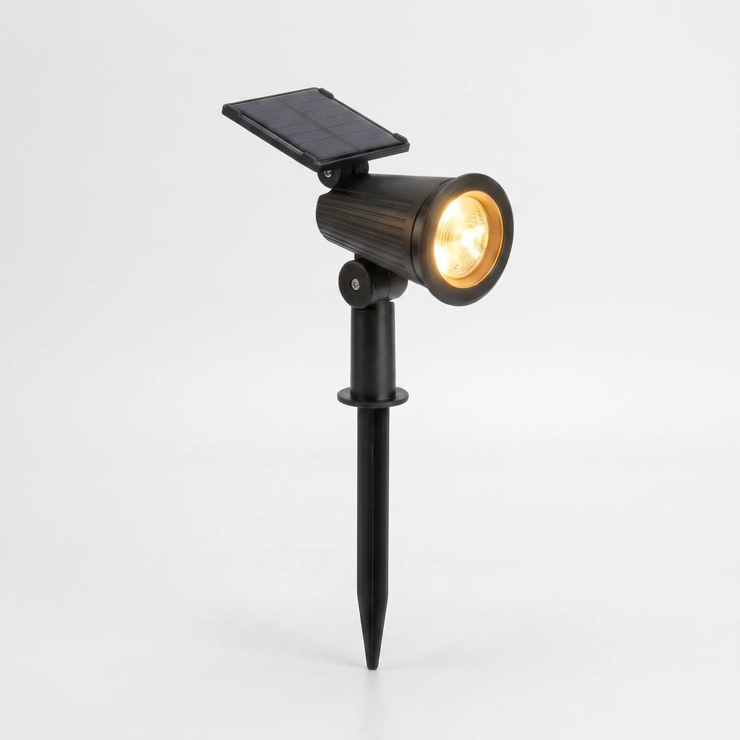Versatile adjustable solar garden spotlight for wireless pathway, wall, or landscape lighting.