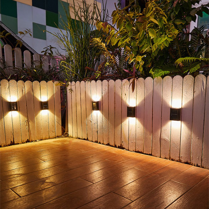 Modern solar LED wall light, wireless outdoor lighting for gardens, patios & driveways. Easy to install.