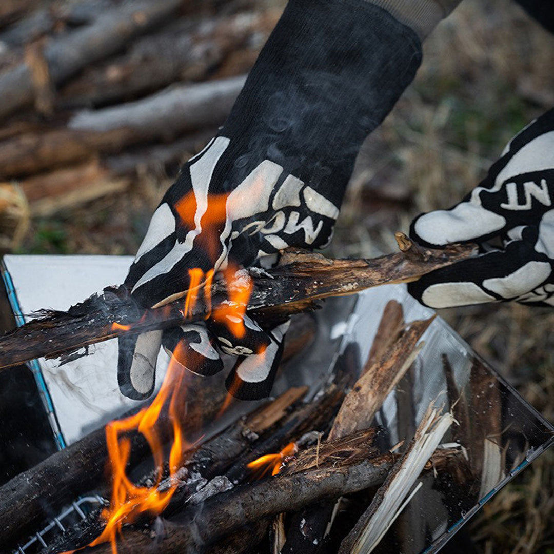 Close-up of fireproof outdoor cooking gloves, ideal for camping and grilling new gear