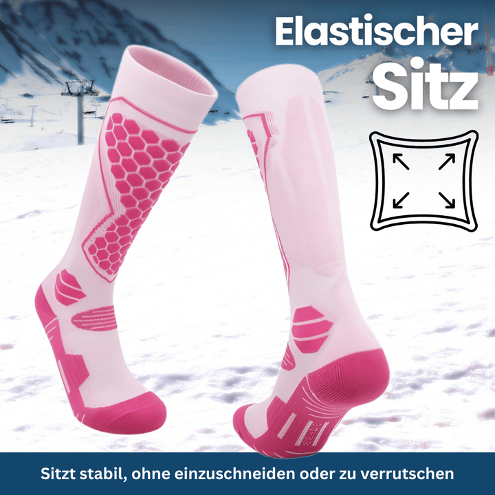 Set of three pairs of colorful thermal winter ski socks: blue, red, and black, stacked