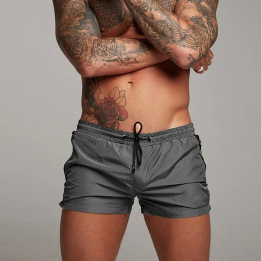 "Pantaloncini da bagno uomo, tessuto blu, asciugatura rapida, elastico 4 vie, ideali per l'estate, vita elastica con coulisse
